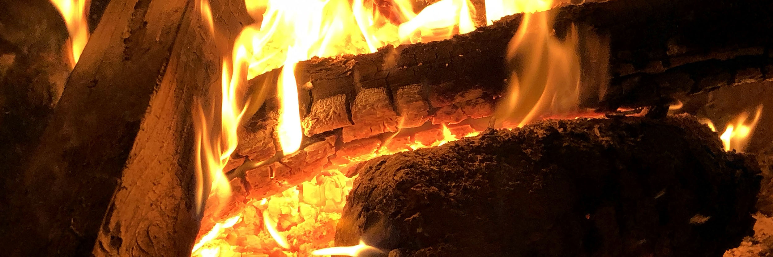 A fire burning wood